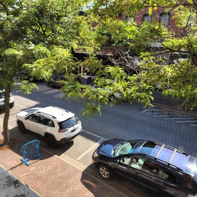 This beautiful downtown building still has original brick work - photo 29