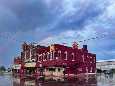 This beautiful downtown building still has original brick work - photo 32