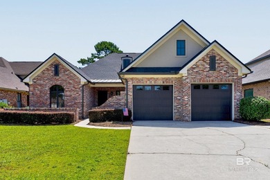 Fairway and water views complement this 2,358-square-foot brick - photo 1