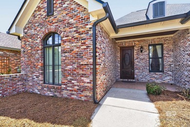Fairway and water views complement this 2,358-square-foot brick - photo 3
