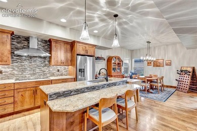 This exceptional residence, tucked behind the private gates of - photo 11