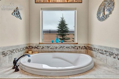 This exceptional residence, tucked behind the private gates of - photo 21