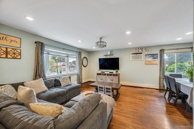 Welcome to this beautifully updated Hi-Ranch located in the - photo 3