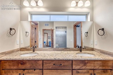 This exceptional residence, tucked behind the private gates of - photo 30