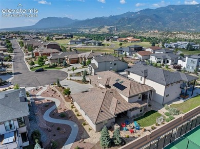 This exceptional residence, tucked behind the private gates of - photo 40