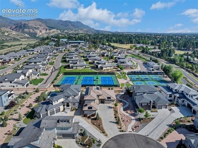 This exceptional residence, tucked behind the private gates of - photo 43