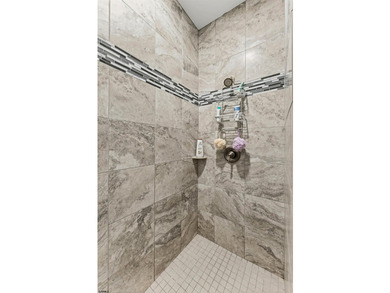 Welcome to this exceptional top-floor condominium in desirable - photo 13