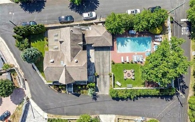 Welcome to this exceptional, oversized two-family residence in - photo 4