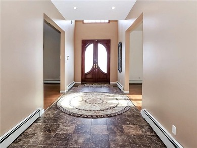 Welcome to this exceptional, oversized two-family residence in - photo 5
