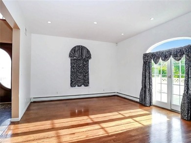 Welcome to this exceptional, oversized two-family residence in - photo 6