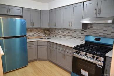 Baychester Area Updated 2 Family Brick attached Home with a - photo 17
