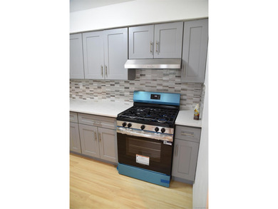 Baychester Area Updated 2 Family Brick attached Home with a - photo 18