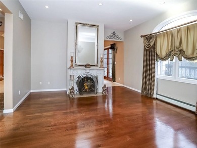 Welcome to this exceptional, oversized two-family residence in - photo 9