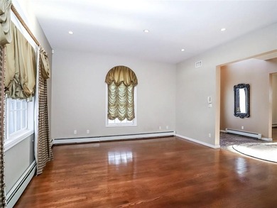 Welcome to this exceptional, oversized two-family residence in - photo 10