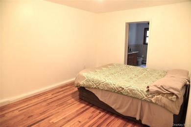 Baychester Area Updated 2 Family Brick attached Home with a - photo 20