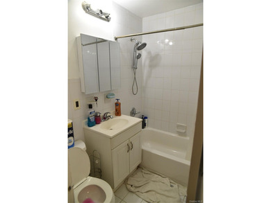 Baychester Area Updated 2 Family Brick attached Home with a - photo 23