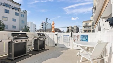 Welcome to this exceptional top-floor condominium in desirable - photo 24