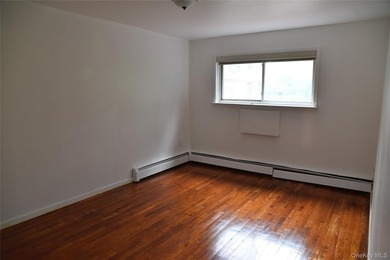 Baychester Area Updated 2 Family Brick attached Home with a - photo 28