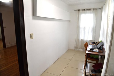Baychester Area Updated 2 Family Brick attached Home with a - photo 32