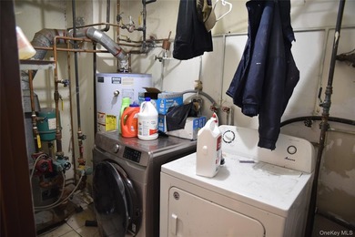Baychester Area Updated 2 Family Brick attached Home with a - photo 35