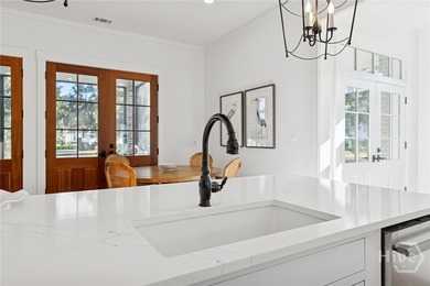 Tucked gracefully into its surroundings, and overlooking the - photo 36