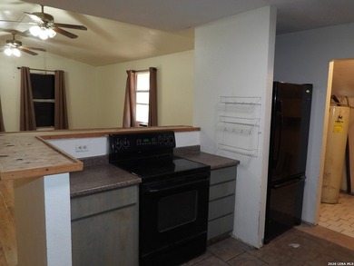 Handyman special with strong upside. Interior needs paint, new - photo 12