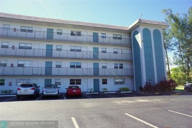 Lake Condo For Sale in Deerfield Beach, Florida