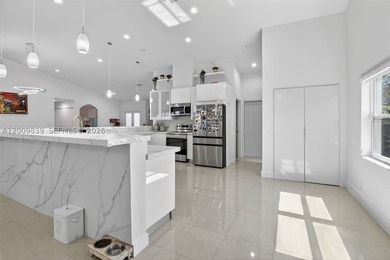 Step into a beautifully remodeled Hollywood estate where style - photo 13