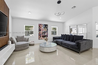 Step into a beautifully remodeled Hollywood estate where style - photo 14