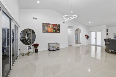 Step into a beautifully remodeled Hollywood estate where style - photo 17