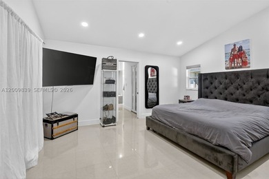 Step into a beautifully remodeled Hollywood estate where style - photo 18