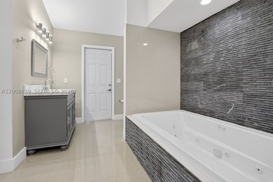 Step into a beautifully remodeled Hollywood estate where style - photo 21