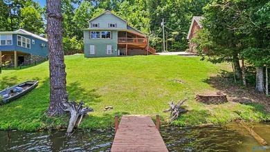 Enjoy relaxed waterfront living where Sugar Creek meets the Elk - photo 14