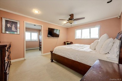 Perfectly positioned on a prime mid block in South Merrick, this - photo 15