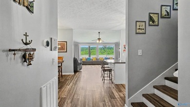 Enjoy relaxed waterfront living where Sugar Creek meets the Elk - photo 15