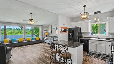 Enjoy relaxed waterfront living where Sugar Creek meets the Elk - photo 19