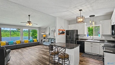 Enjoy relaxed waterfront living where Sugar Creek meets the Elk - photo 22