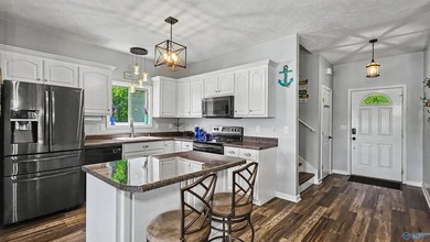 Enjoy relaxed waterfront living where Sugar Creek meets the Elk - photo 25