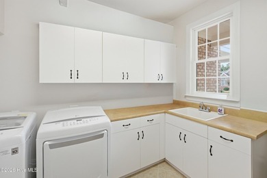 Nestled within the gated golf course community of Porters Neck - photo 34