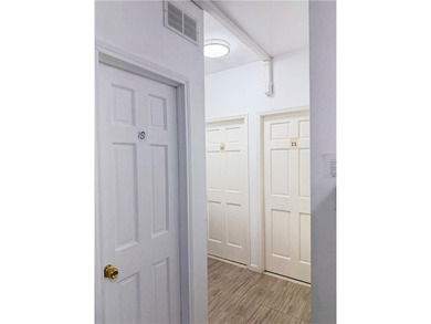 Welcome to this 2-family brick house located in Sunset Park. The - photo 3