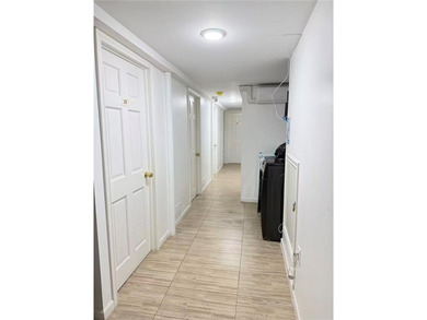 Welcome to this 2-family brick house located in Sunset Park. The - photo 4