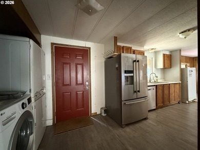 This spacious 1,800+ square foot manufactured home offers an - photo 11