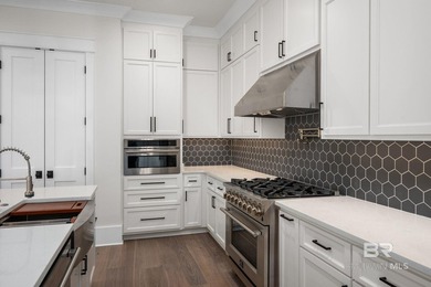 Located within the beautiful, gated Waterways community, this - photo 12