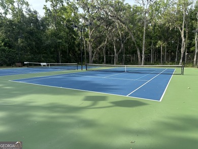 Beautiful wooded lot nestled within the exclusive - photo 12