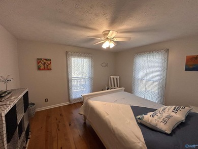 Nestled on the scenic shores of Weiss Lake in the sought-after - photo 22