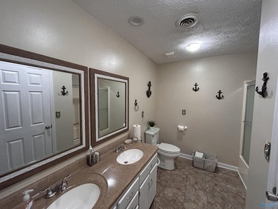 Nestled on the scenic shores of Weiss Lake in the sought-after - photo 32