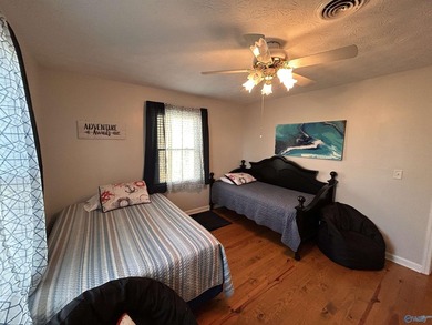 Nestled on the scenic shores of Weiss Lake in the sought-after - photo 35