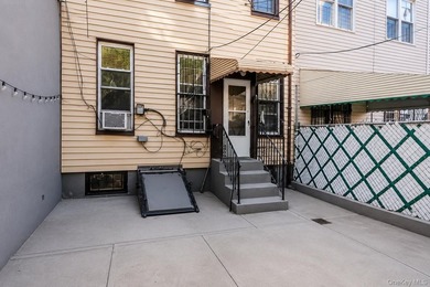 An exciting opportunity to own a substantial three family - photo 13