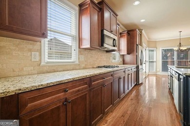 Welcome home to this move-in-ready 5BR/4BA custom home in the - photo 5
