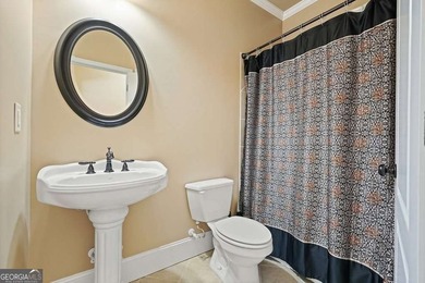 Welcome home to this move-in-ready 5BR/4BA custom home in the - photo 8